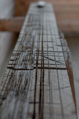 the texture of the strai raw board with saw cuts and cuts