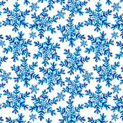 Seamless pattern with decorative snowflakes painted with watercolor and isolated on white background