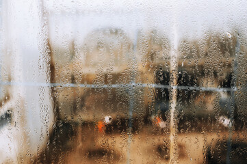 Background, texture of a drop of water and from the rain on the glass.