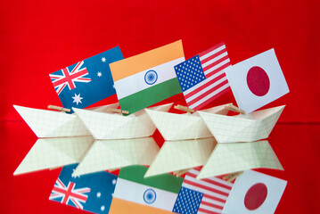ships with flags of Australia, United States, Japan, India as new military alliance quad security pact between countries	
