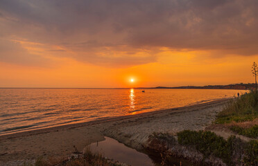 Obraz premium Beautiful view of red sunset in Mediterranean Sea. Greece.