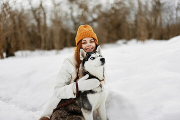 woman with a purebred dog winter landscape walk friendship Lifestyle