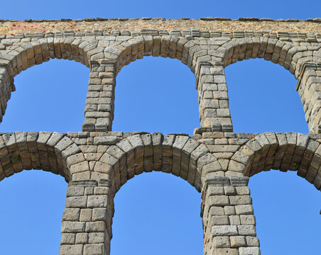 Close-up image of the Geometric Pattern of the Roman Aqueduct of Segovia in the Spanish Plaza De Artilleria.