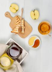 Flatlay with a healthy breakfast, snack. Toast with honey and jam, apples, herbal tea
