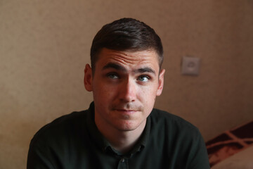 Defocus charming thoughtful, charismatic man trying think up solution. Creative handsome brunet...