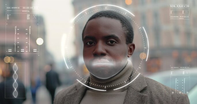 Portrait of handsome african american man smiling on camera with round frame of recognition system on his face. 3D scanning and authentication technology concept.