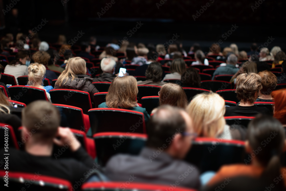 Wall mural theatre audience seated before performance