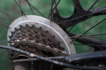 Close-up of a mountain bike bicycle sprocket. Lack of lubrication. Selective soft focus
