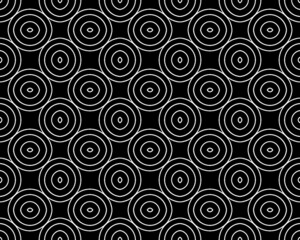 Illustration of a seamless spiral shaped tile pattern on a black background