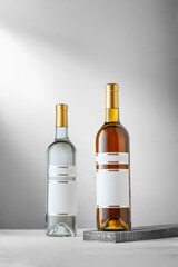 Bottles of Armagnac, cognac and Grape vodka or tequila with blank label, no brand mockup,...