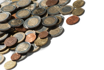 A lot of euro coin money on a white background for investing, trading and business enrichment