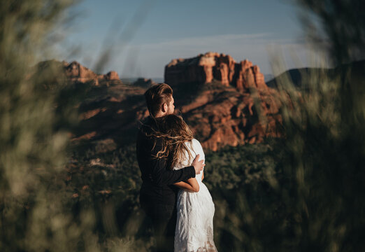 Young couple hugging and enjoying the view of the Sedona Arizona