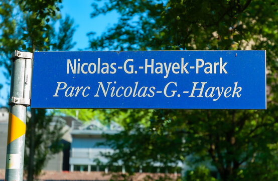 Biel, Switzerland - Mai 11, 2022: A street sign for Nicolas G. Hayek Park in Biel