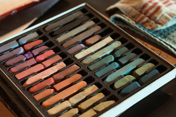 box of watercolor pastel chalks for artists