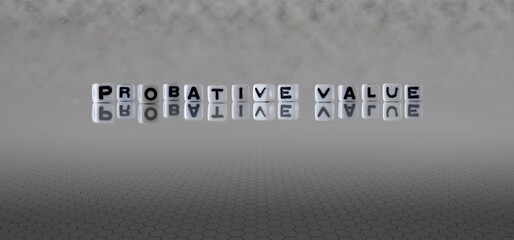 probative value word or concept represented by black and white letter cubes on a grey horizon background stretching to infinity