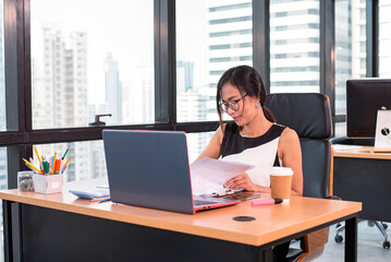 business woman check document in modern office