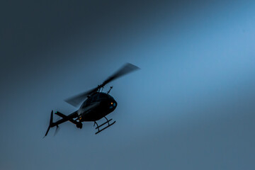 Fototapeta na wymiar Helicopter On Its Way