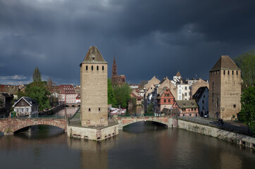 Fototapeta na wymiar Covered Bridges (Ponts Couverts ) on Ill river in Strasbourg (France)