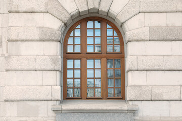 View of beautiful arched window in building outdoors