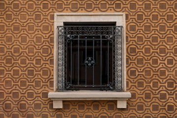Beautiful window with grills in building outdoors