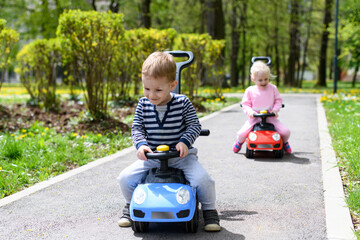 Little Kids Teaching to Drive A Toy Car