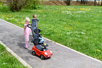 Young Kids Playing With Toy Car