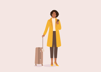 One Black Businesswoman In Yellow Coat Holding Luggage And Looking At Her Mobile Phone. Full Length, Flat Design, Character, Cartoon.