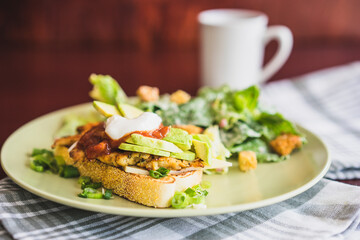 Grilled chicken sandwich with avocado