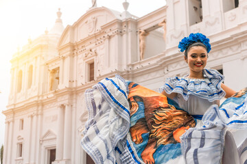 Photo with copy space of a young traditional dancer from Nicaragua wearing the typical costume of...