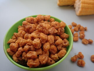 Homemde Jagung marning (Indonesia) or Corn nuts, also known as toasted corn, quico, or Cracker are a snack food made of roasted or deep-fried corn kernels.