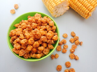 Homemde Jagung marning (Indonesia) or Corn nuts, also known as toasted corn, quico, or Cracker are a snack food made of roasted or deep-fried corn kernels.