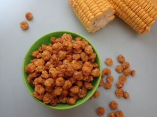Homemde Jagung marning (Indonesia) or Corn nuts, also known as toasted corn, quico, or Cracker are a snack food made of roasted or deep-fried corn kernels.