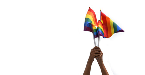 Isolated rainbow flags, symbol of lgbt people, holding in hands on white background, concept for showing and respecting human gender diversity and human rights, celebrating lgbtq+ in pride month.