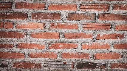 Background image of old brick wall of abandoned house