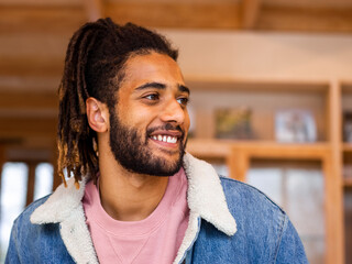 Portrait of young man with dreadlocks
