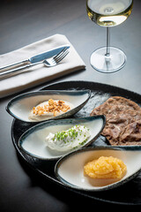 pita with different dips and white wine