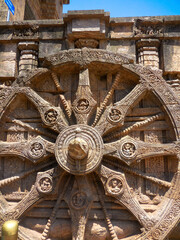 The famous stone chariot wheel engraved in the walls of historic Sun temple in Konark (Odisha, India), a world heritage site.