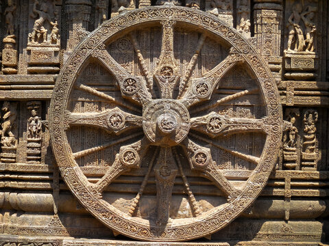 The famous stone chariot wheel engraved in the walls of historic Sun temple in Konark (Odisha, India), a world heritage site.