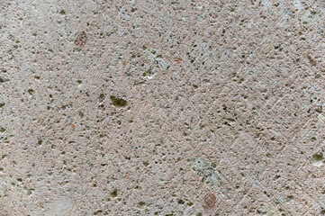 Stone texture. Detailed shot of sawn stone. Circular saw marks on the rough surface. Abstract multitasking background