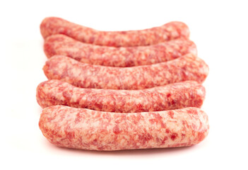 Five Fresh Raw Pork Bratwurst Isolated on a White Background