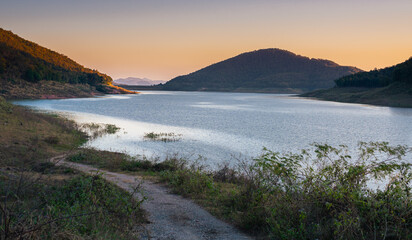 lake landscape, picturesque mountain lake in the summer morning, Beauty of nature concept background. lake and mountain on background in the morning time. natural landscape in Thailand.