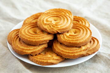 Homemade Sprits Biscuits on a Plate, side view. Close-up.