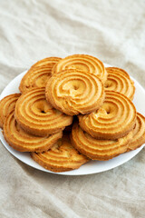 Homemade Sprits Biscuits on a Plate, side view.