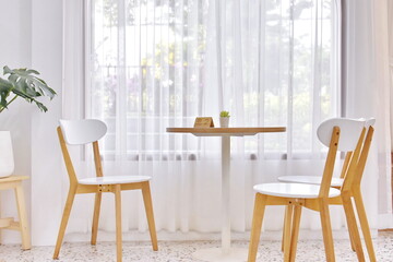 Concept and design front of Coffee Shop  and  white seating.