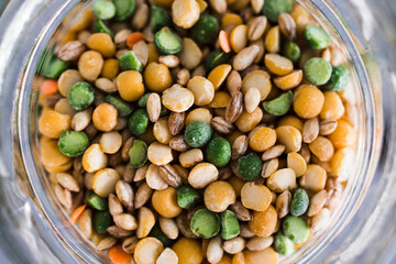 spice jar with lentil and bean soup mix close-up shot of pantry ingredients,