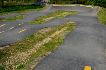 bike path in the car park Pumping (moving up and down) is used instead of pedaling and bouncing to...