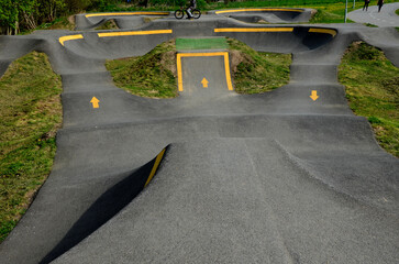bike path in the car park Pumping (moving up and down) is used instead of pedaling and bouncing to...
