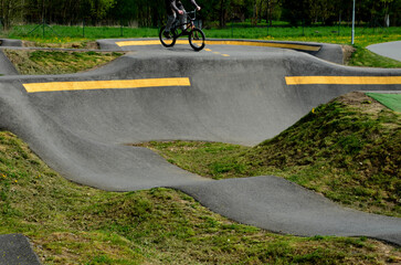 bike path in the car park Pumping (moving up and down) is used instead of pedaling and bouncing to...