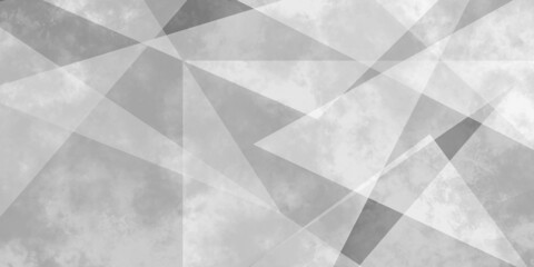 Abstract geometric background with triangles. White and grey background. space design concept. textured white transparent material in triangle shapes in random Decorative web layout or poster, banner.