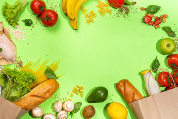 Fresh vegetables, meat, bread fruits in paper grocery bag. Delivery healthy food background. Healthy food cooking ingredients on white,background, Shopping food supermarket and clean vegan eating